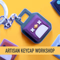 Artisan keycap with decorative elements on a yellow background, featuring the text 'Artisan Keycap Workshop'.