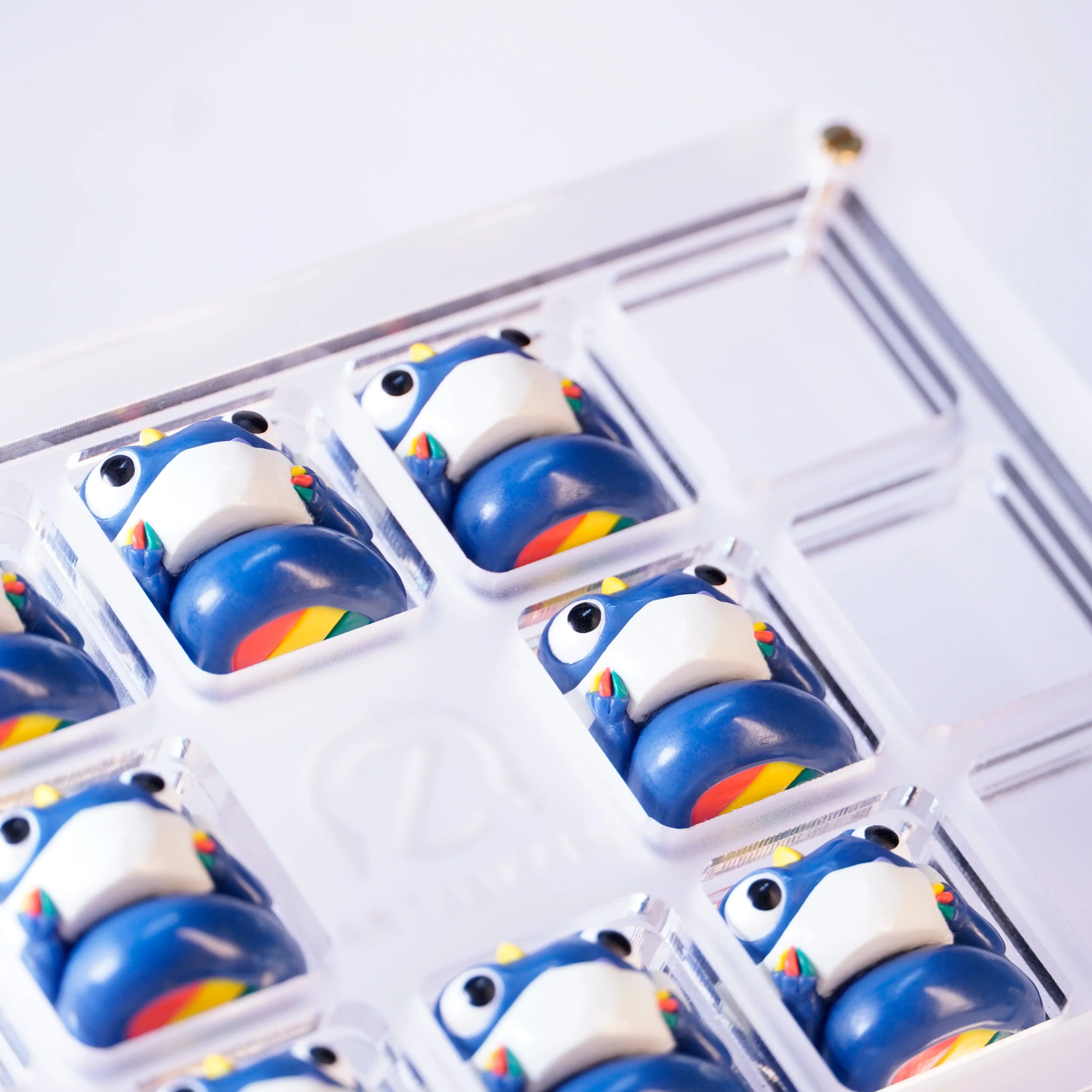 Chomper GMK³ artisan keycaps in acrylic display tray, top-down view