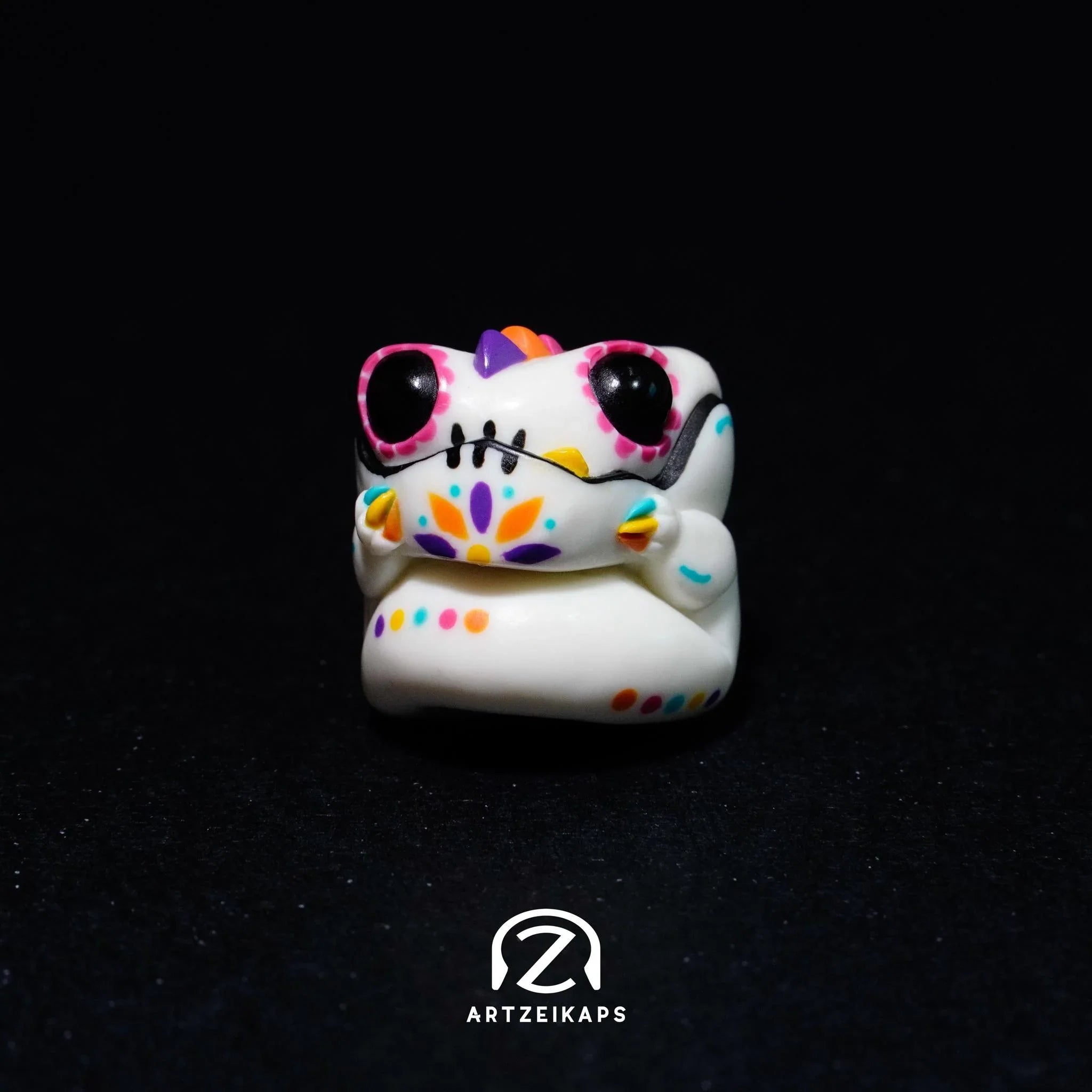 Chomper GMK Mictlan artisan keycap in white with Day of the Dead floral face paint design, solo front view on dark background