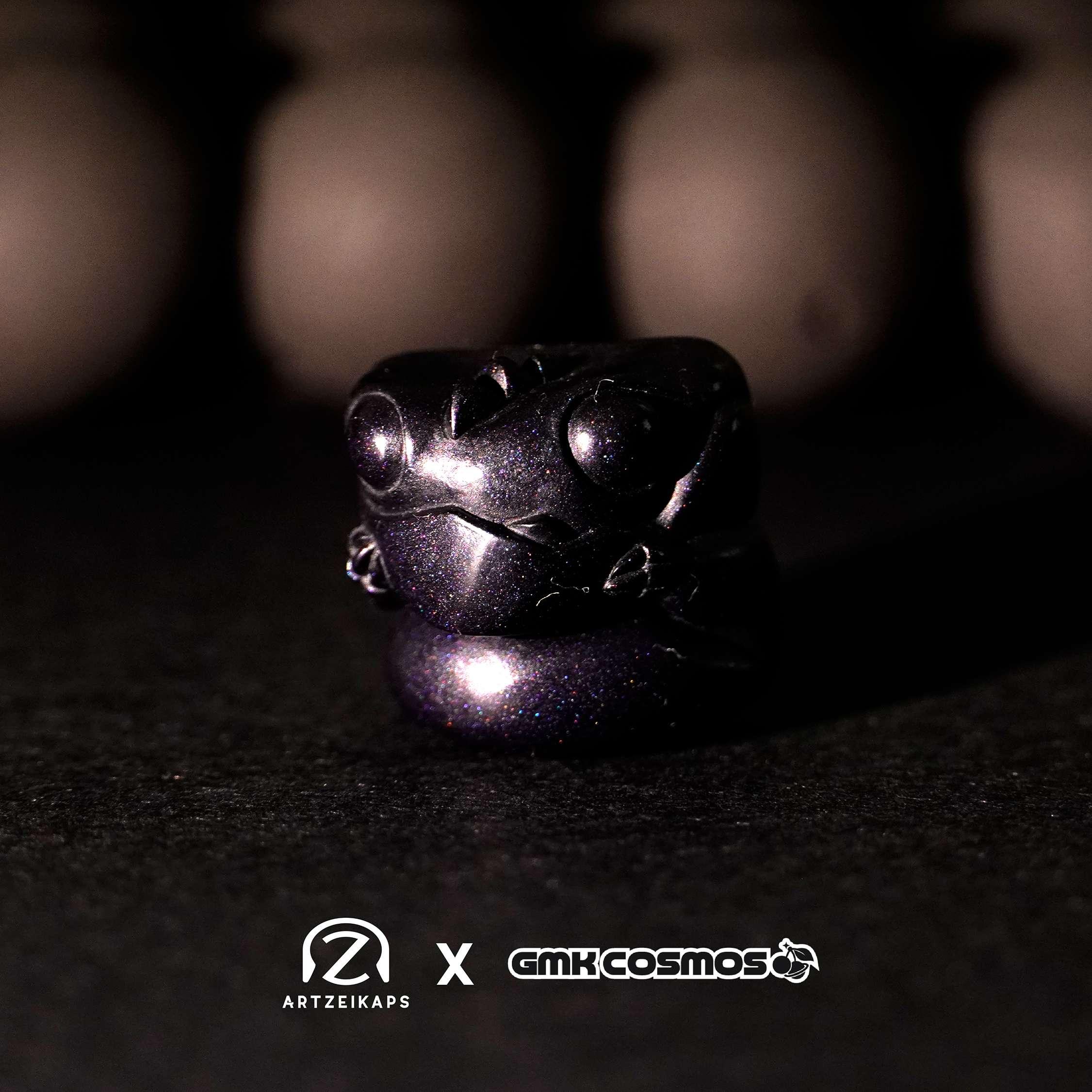Chomper GMK Cosmos artisan keycap in dark galaxy finish, close-up on dark background — Artzeikaps x GMK Cosmos collab