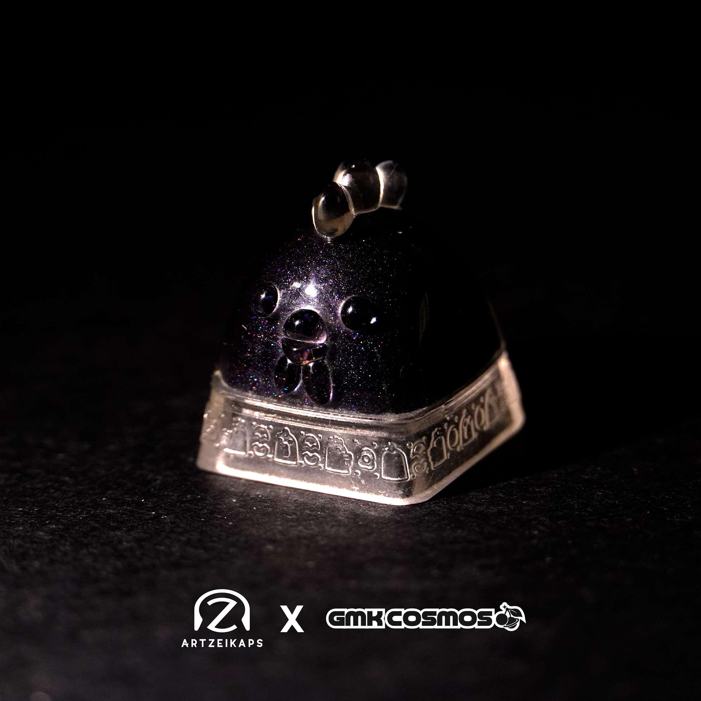 Cluckey GMK Cosmos artisan keycap in dark galaxy finish, close-up on dark background — Artzeikaps x GMK Cosmos collab