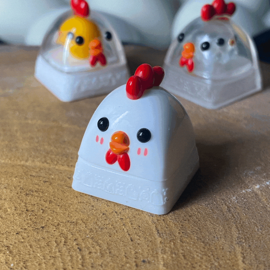 Animated gif of Cluckey artisan keycaps — OG Series by Artzei Studio