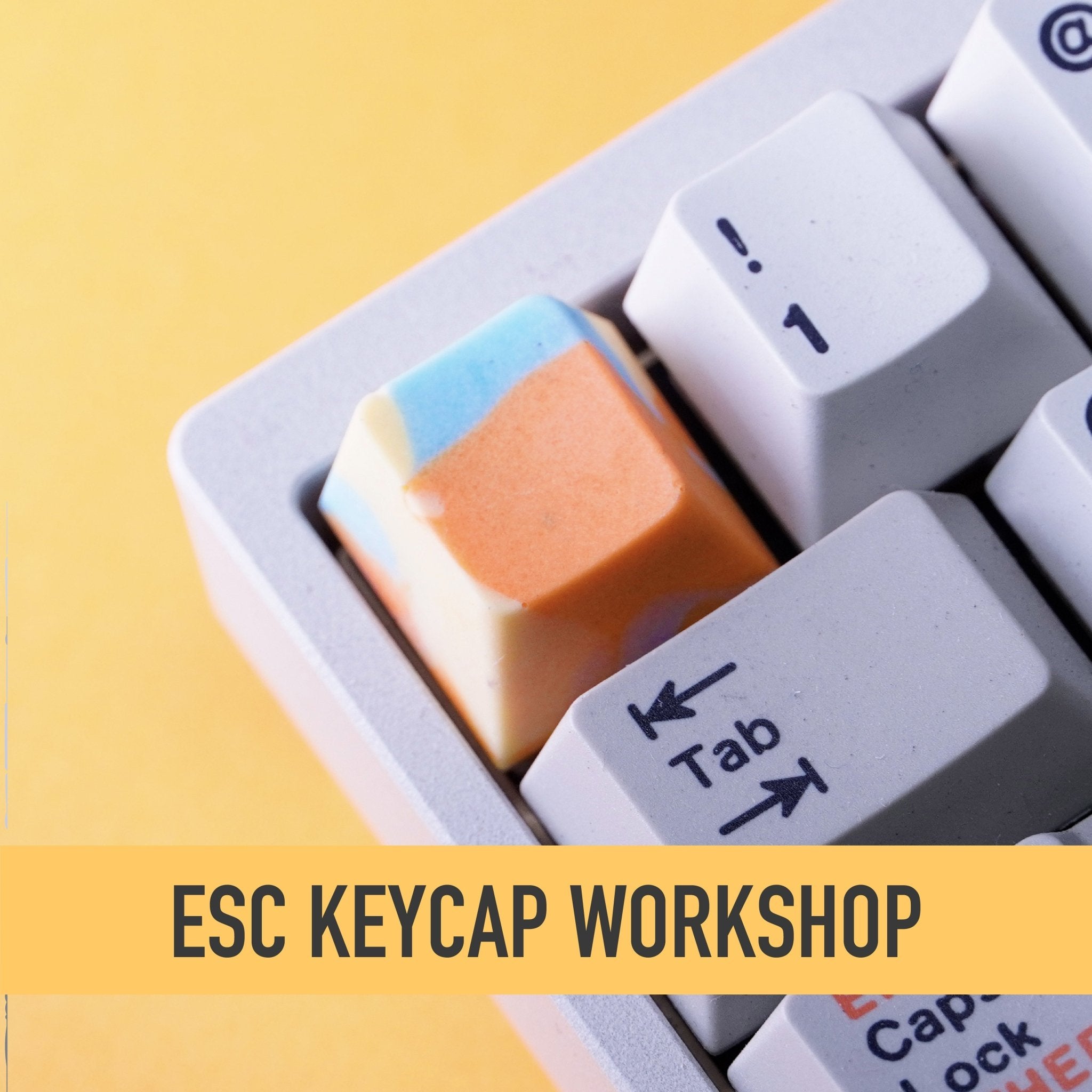ESC Keycap Workshop — artisan keycaps on a mechanical keyboard with yellow accent