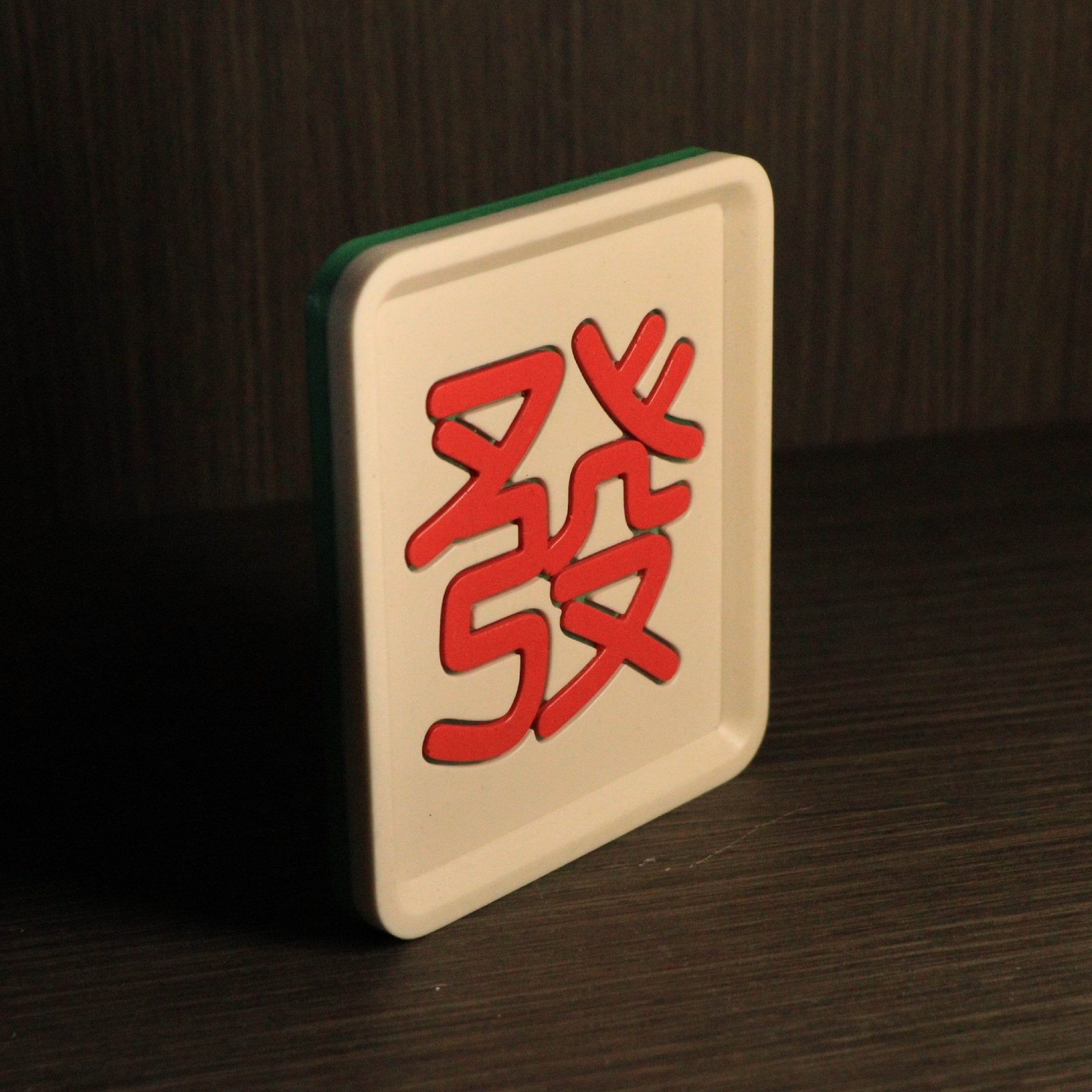Jesmonite Fa mahjong tile tray with raised character detail, designed for jewellery or desk essentials
