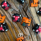 Halloween-themed lil' huey with smunkey blood vamp artisan keycap on wooden surface by Artzeikaps