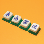 Mahjong wind tiles artisan keycaps (East, South, West, North) for mechanical keyboards on a bright yellow background.