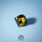 Smunkey Fall '21 artisan keycap in navy blue, front and back view on light blue background