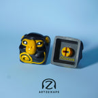 Smunkey Fall '21 artisan keycap in Navy Blue, front and back view on light blue backgroundvy 