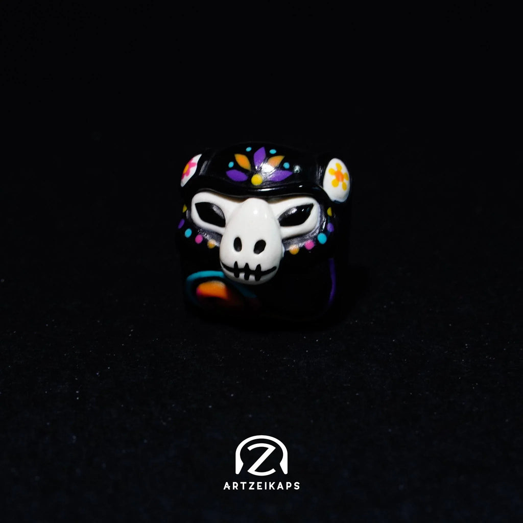 Smunkey GMK Mictlan artisan keycap in black with Day of the Dead skull and floral face paint design, solo front view on dark background