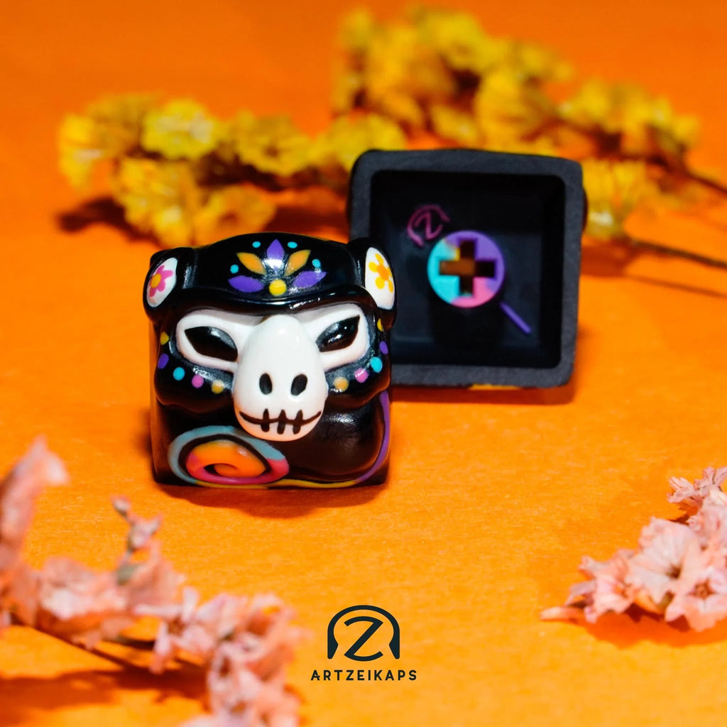 Smunkey GMK Mictlan artisan keycap dark colourway front and back view with marigold flowers on orange background