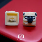 Front and Back view of Smunkey artisan keycap Milky Oreo colourway by artzeikaps